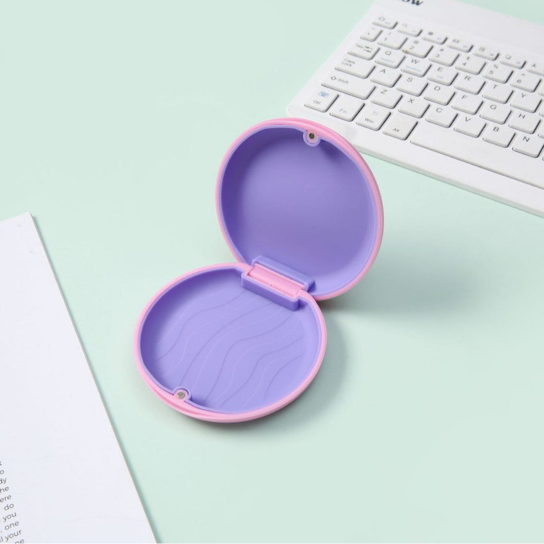 Pink ClearCare retainer travel case